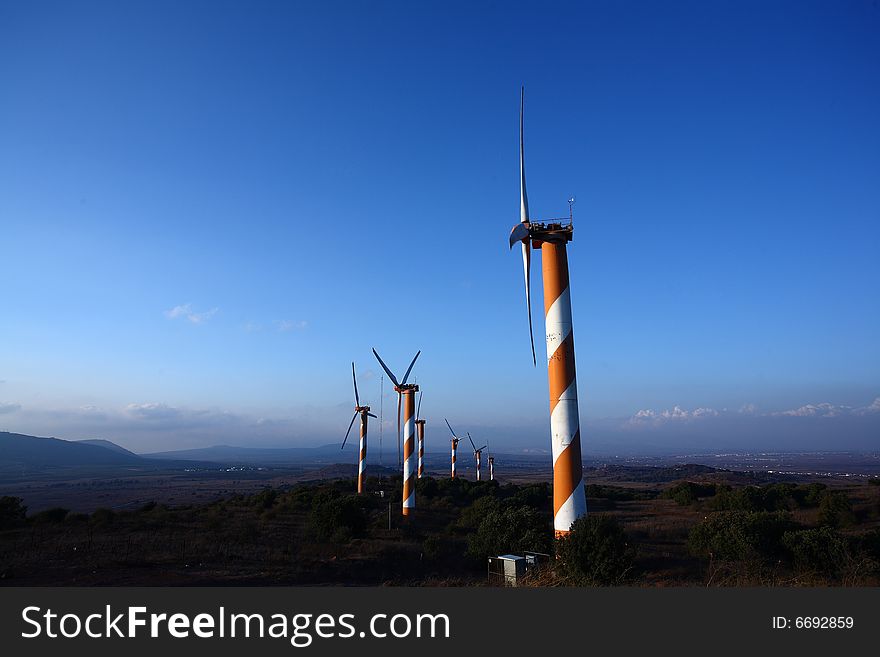 Wind turbine making green electricity. Wind turbine making green electricity