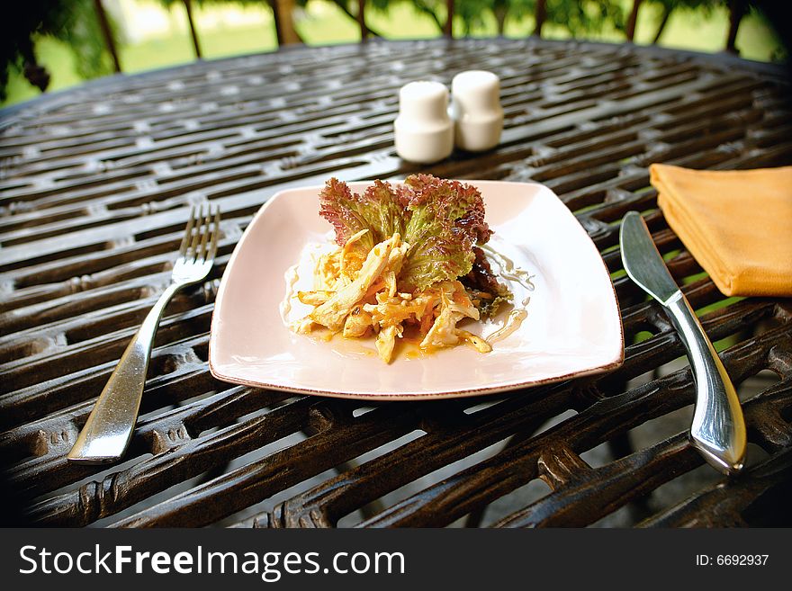 Chicken salad served with lettuce as a starter