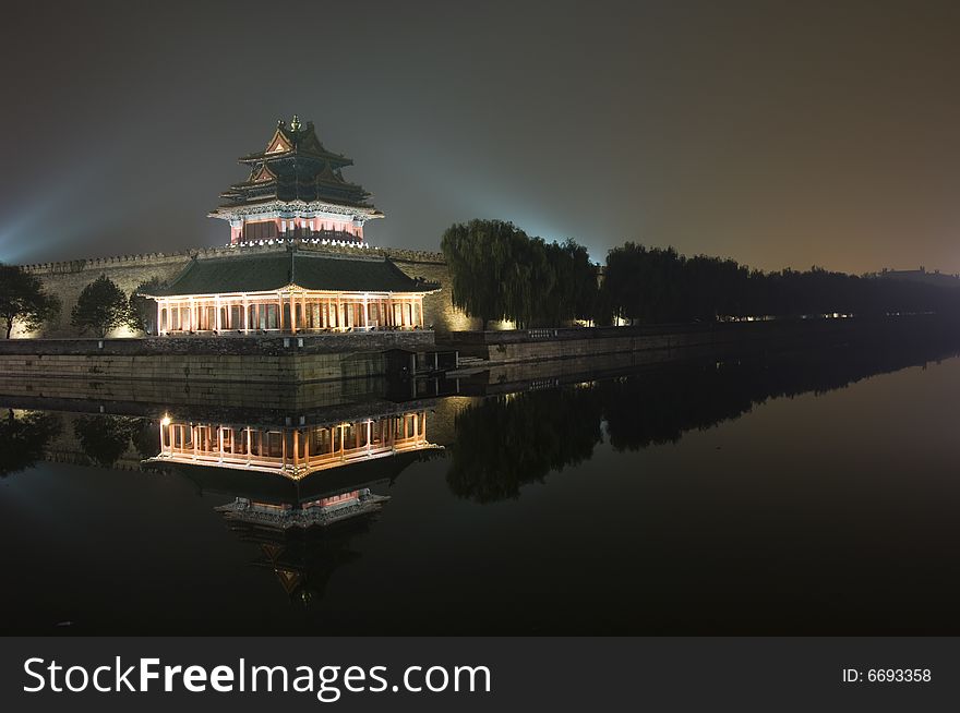 Moat, turret, wall and buildings in forbidden city, Beijing, China. Moat, turret, wall and buildings in forbidden city, Beijing, China