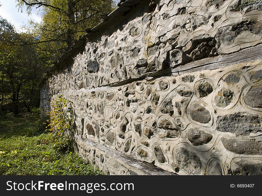 An old masonry wall with built in stones