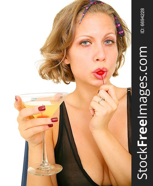 Sexy pin up girl eating cherry and holding margarita