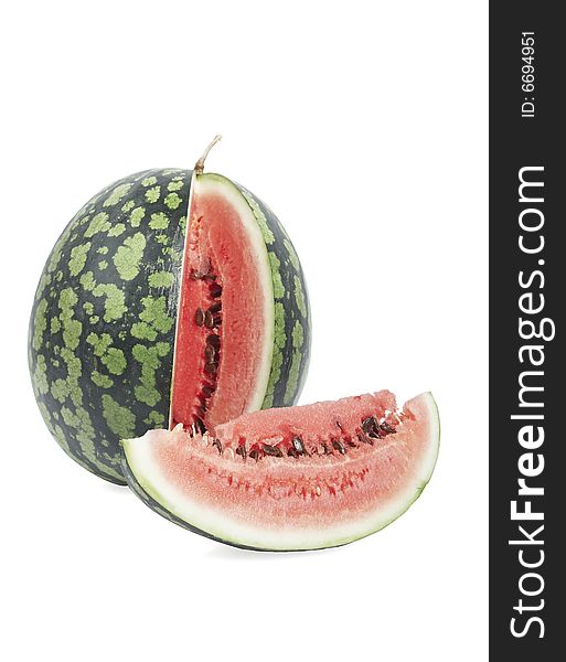 Water-melon with the segment cut off from it. Isolated on a white background. Water-melon with the segment cut off from it. Isolated on a white background.