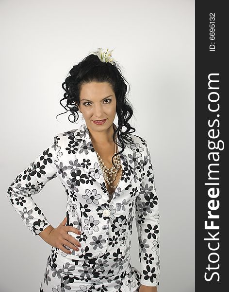 Fashion woman posing in a flower suit white-black,more photos with this model in