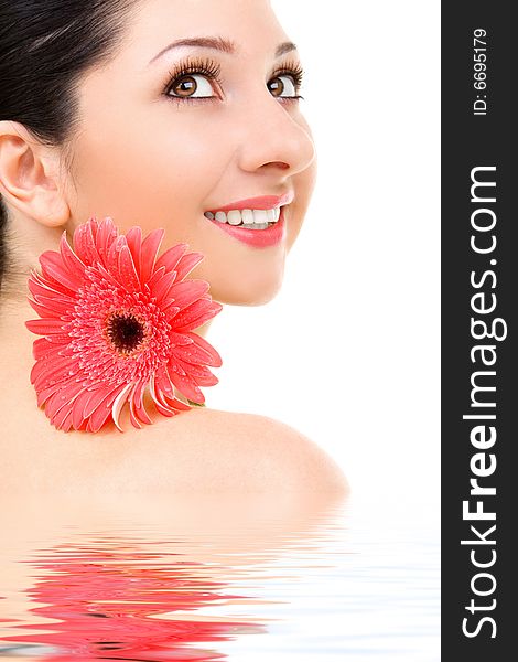 Young woman with gerber flower