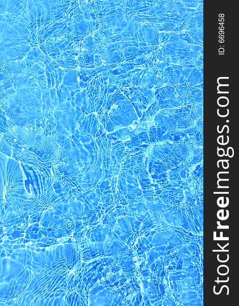 Blue swimming pool water background. Blue swimming pool water background