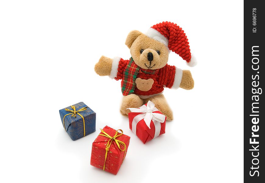 Teddy Bear and three colour gift boxes isolated on white background. Teddy Bear and three colour gift boxes isolated on white background.