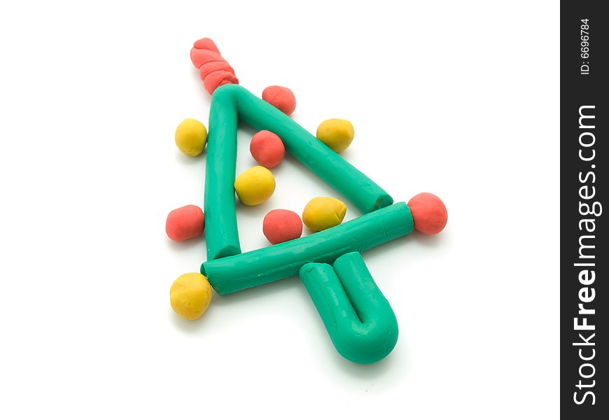 The plasticine Christmas tree isolated on the white background.