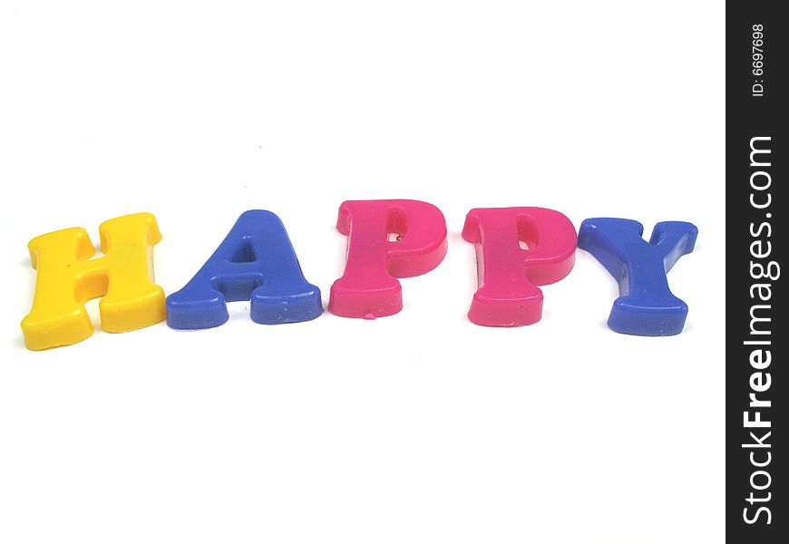 The word happy spelled out in 3d