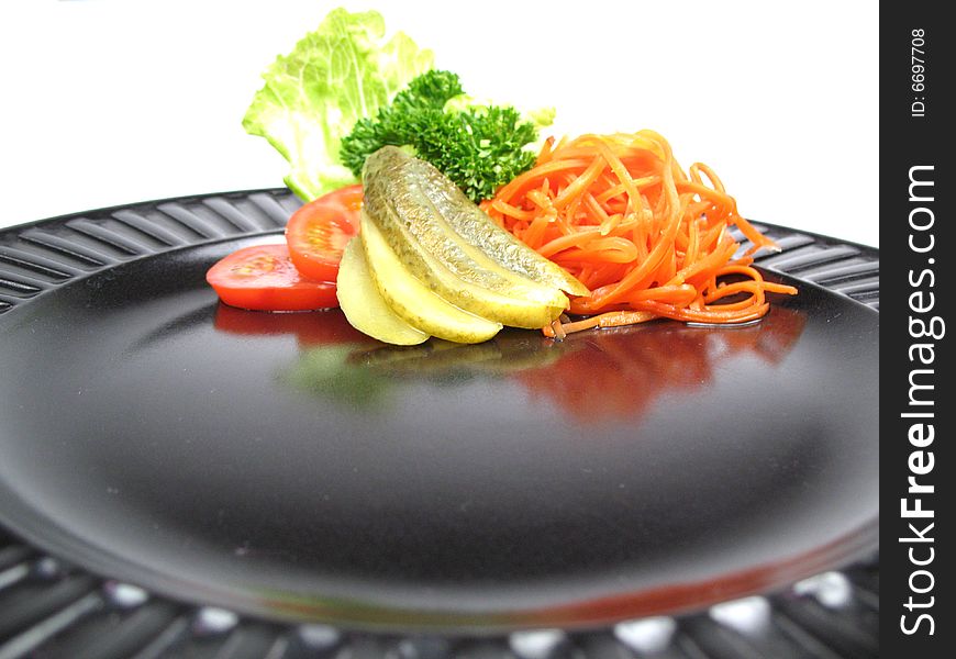 Salad On Black Plate