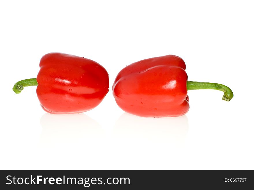 Two red sweet peppers isolated on the white background