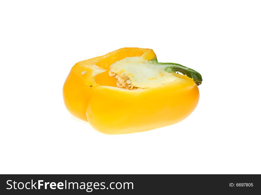 Half of yellow sweet pepper isolated on the white background