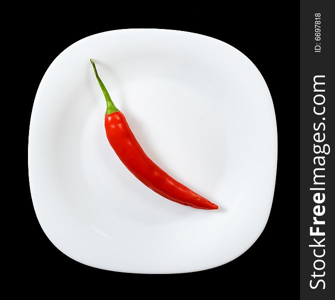 Hot chili pepper on white plate. Hot chili pepper on white plate.