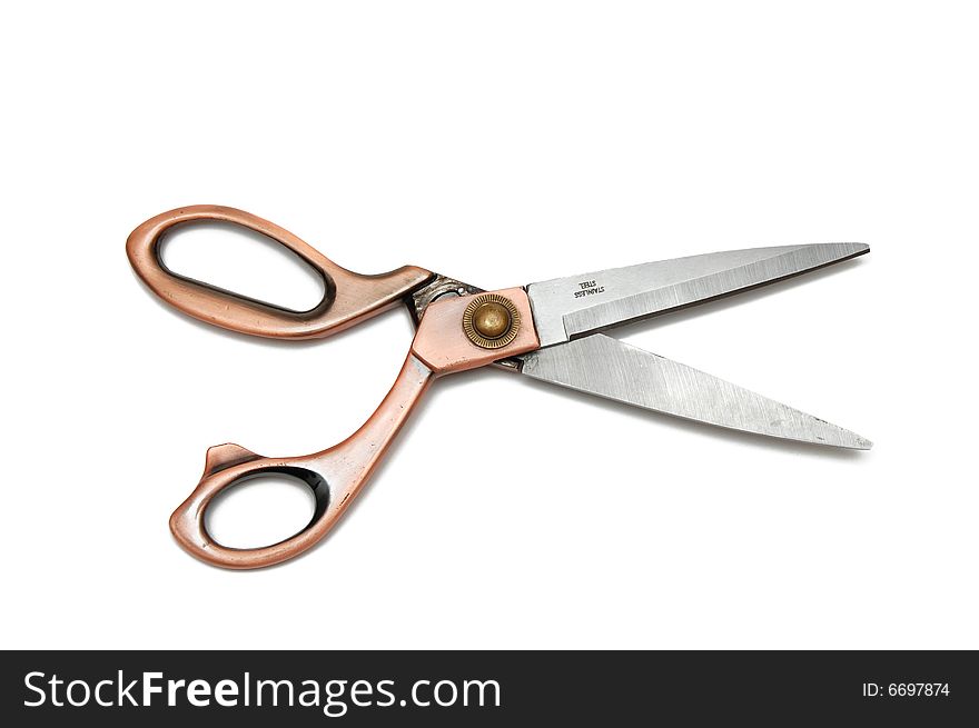 Photo of steel scissors on a over white background