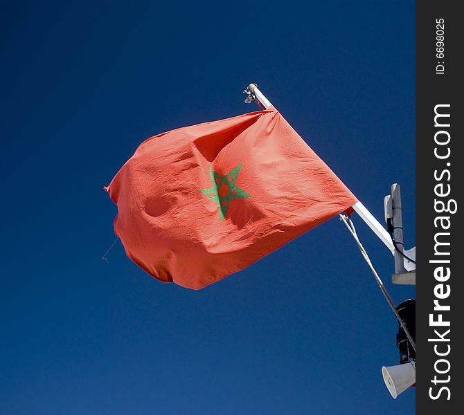 Flag of Morocco waving on a ferry boat. Flag of Morocco waving on a ferry boat