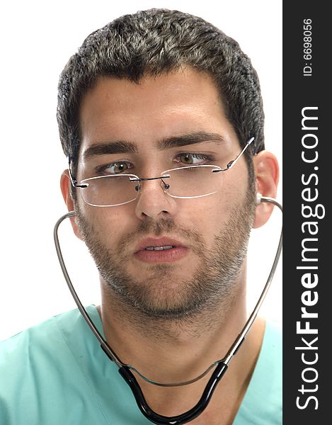 Doctor with stethoscope in his ears looking squint against white background