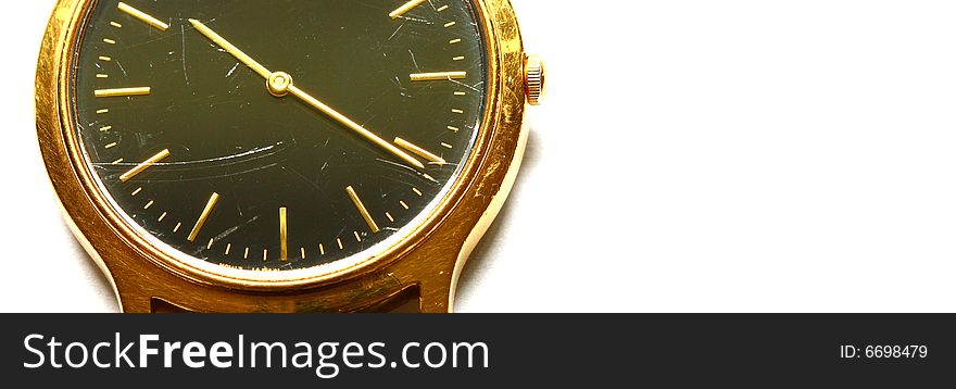 Closeup of gold watch face