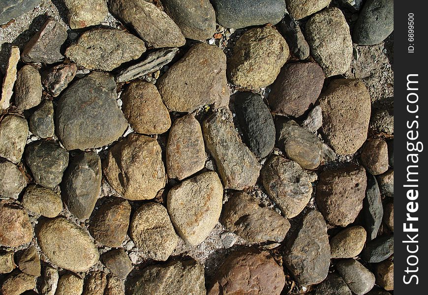 Old stone pavement background in Novgorod Russia.