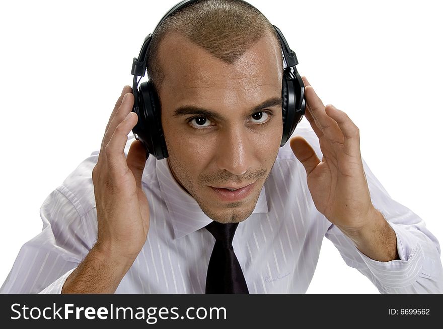 Businessman looking into camera on an isolated background