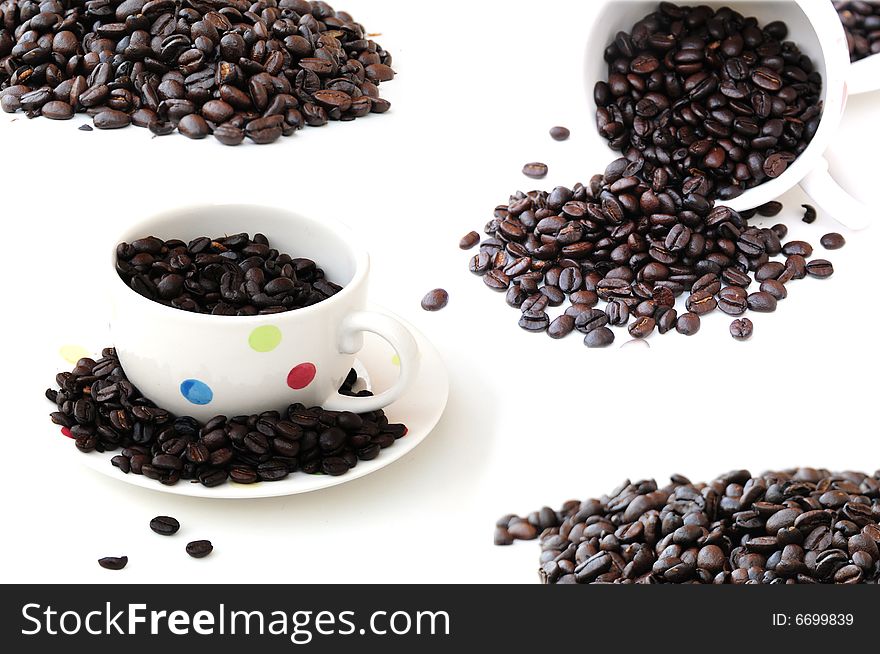 Shot of coffee cups and coffee beans. Shot of coffee cups and coffee beans