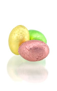 Colorful Wrapped Chocolate Eggs On White Stock Photos Colorful Wrapped Chocolate Eggs On White Stock Photos