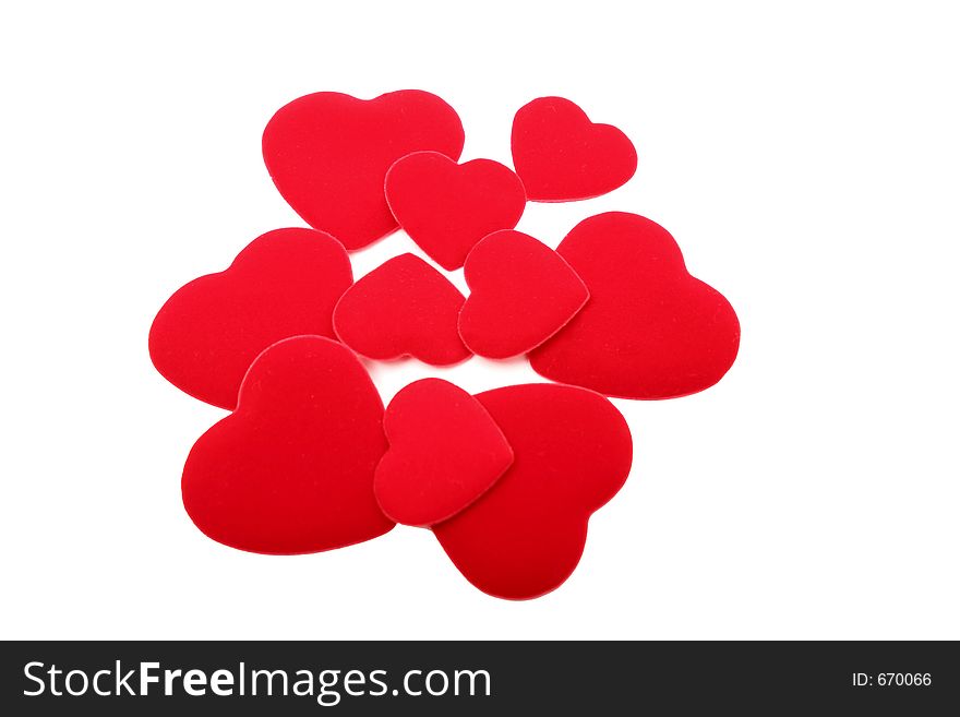 Digital photo of several velvet hearts.