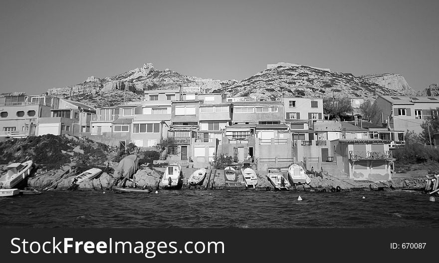 Black and white houses and small harbour at les goudes, marseille, france. Black and white houses and small harbour at les goudes, marseille, france