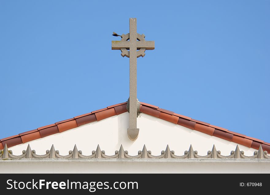 Cross on old spanish church