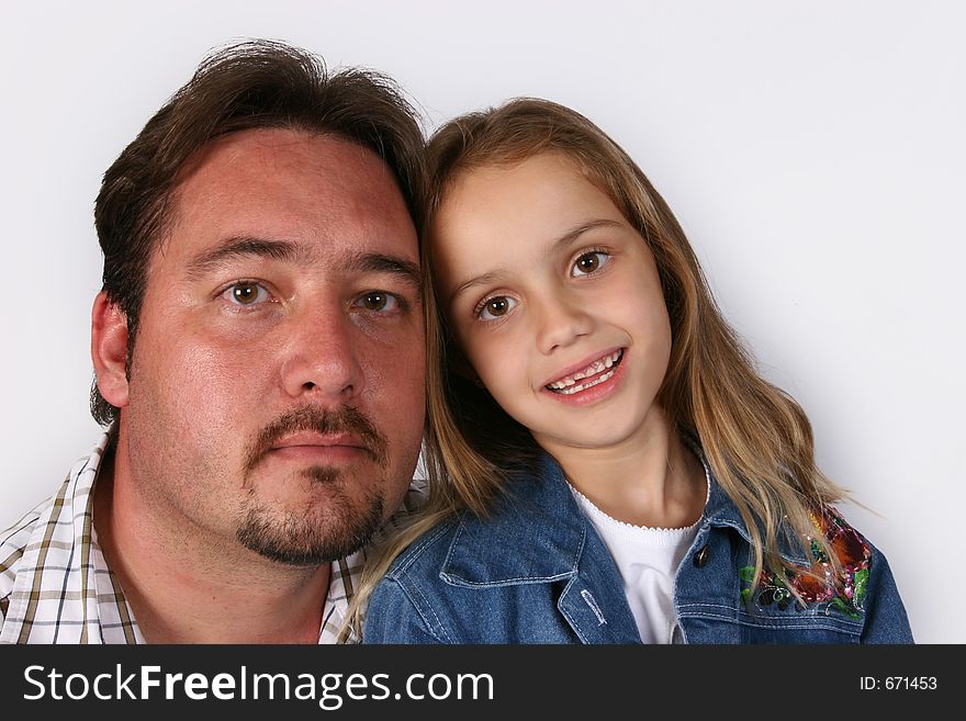 Young family posing in studio. Young family posing in studio