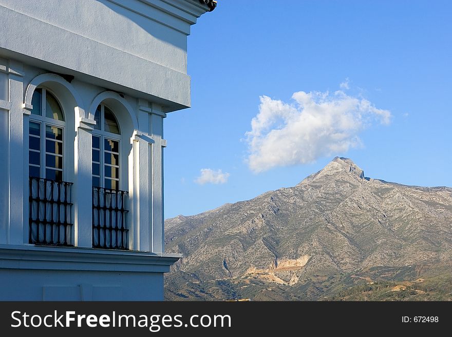 Building And Mountain Views Of Aloha Pueblo In Spain