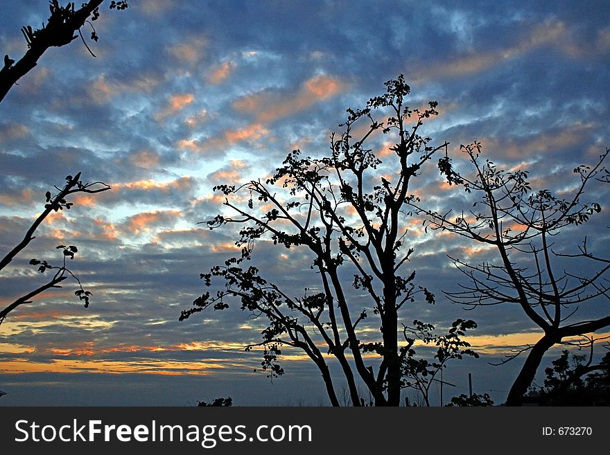 Vivid sunset colors and hues with clouds. Vivid sunset colors and hues with clouds