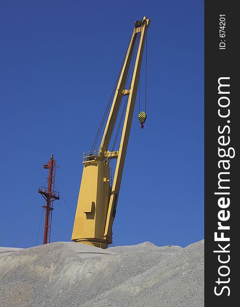 Yelow crane and blue sky. Yelow crane and blue sky