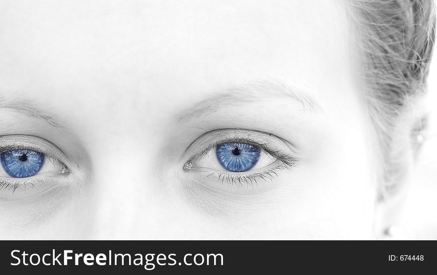 Female in black and white with blue eyes. Female in black and white with blue eyes