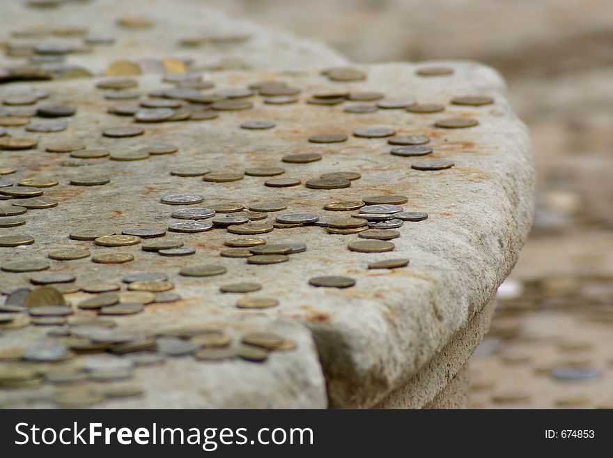 Coins on staircase on Red Square in Moscow