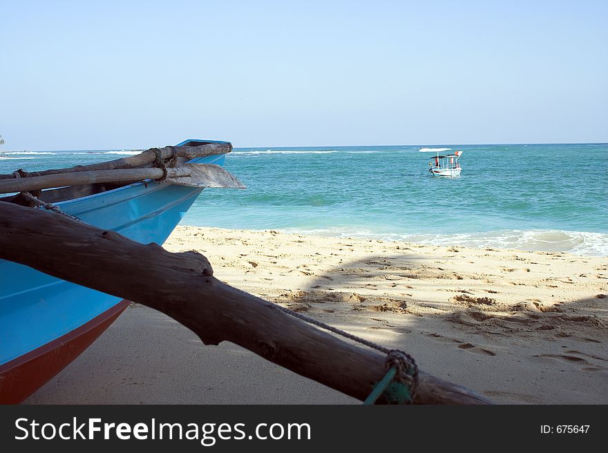 Fishing Boat & the beach and lifeguard