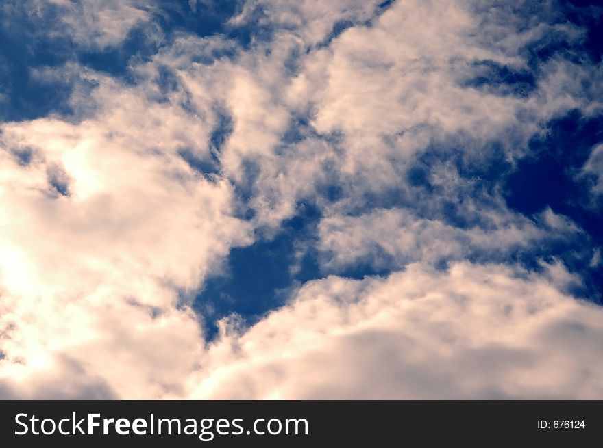 Red clouds in blue