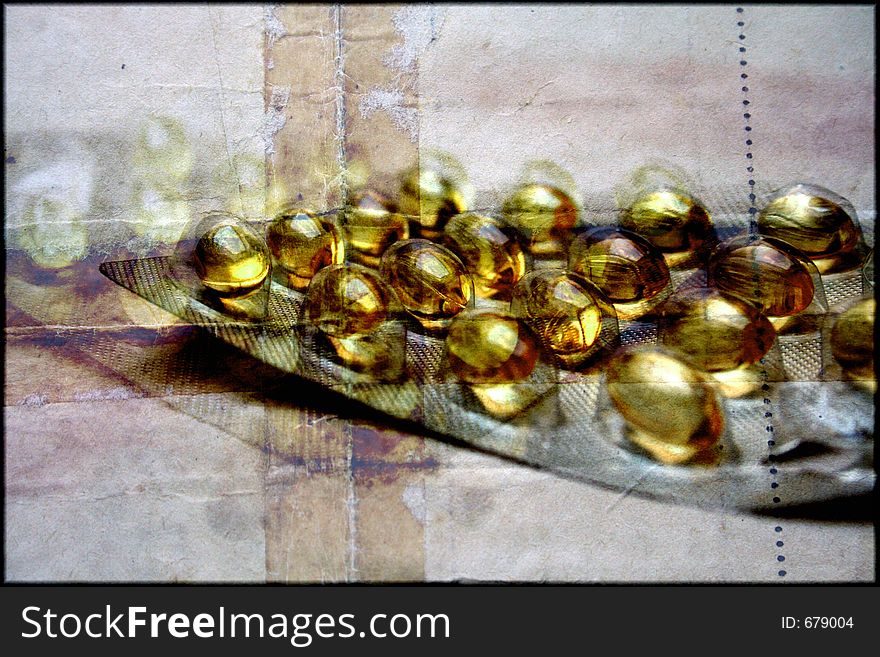 Homeopathic capsules on a grungy background
