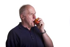 Old Bald Guy Enjoying A Peach Stock Photography Old Bald Guy Enjoying A Peach Stock Photography