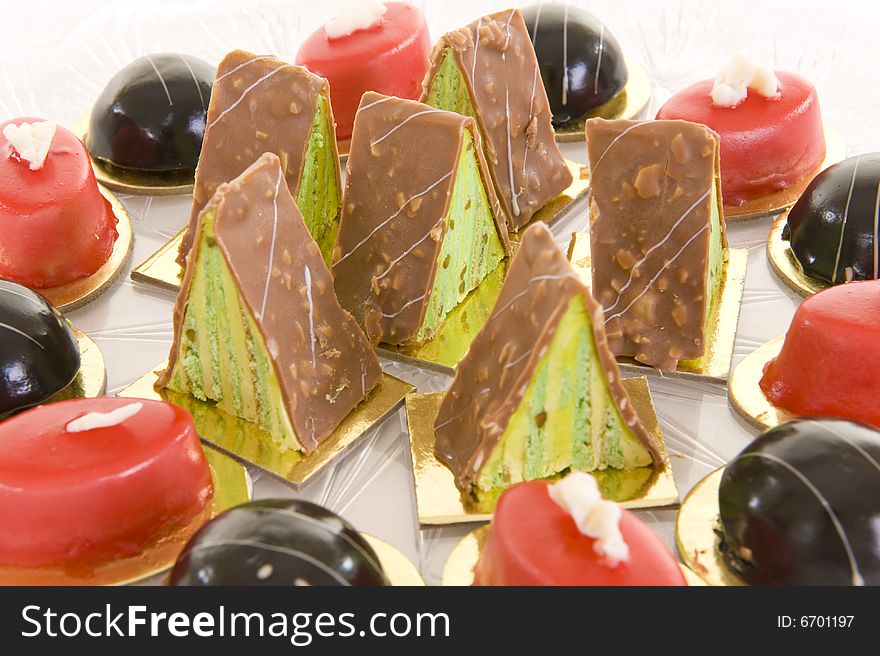 A variety of colorful confectionery sweets on a white background.