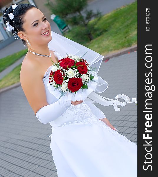 Portrait of the bride with bouquet
