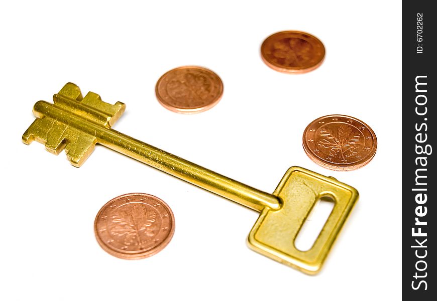 Key with EURO and coins. Low DOF