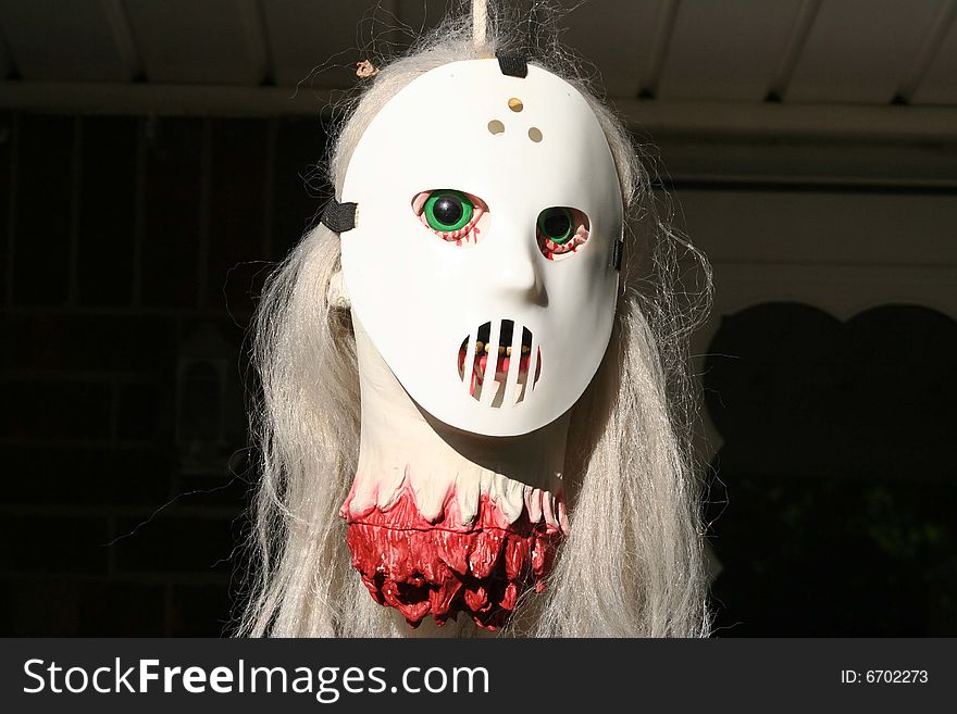 Image of scary halloween mask and skull. Image of scary halloween mask and skull