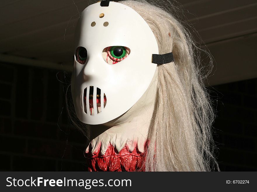 Image of scary halloween mask and skull. Image of scary halloween mask and skull