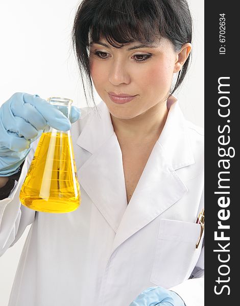 Chemist or scientist studying holding a conical flask. Chemist or scientist studying holding a conical flask.