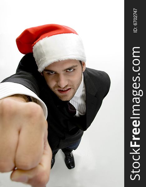 High angle view of man showing punch isolated on white background