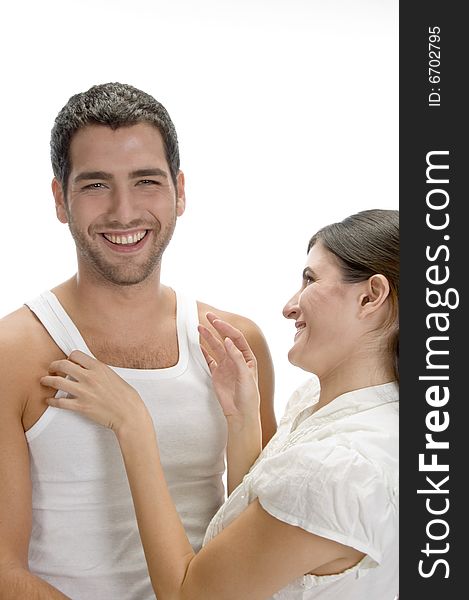 Laughing romantic couple against white background
