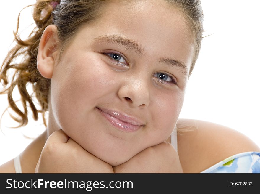 Portrait of smiling girl on an isolated background