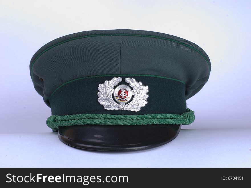 A German police hat, against a white background