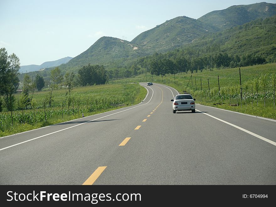 Driving on the road with blue sky