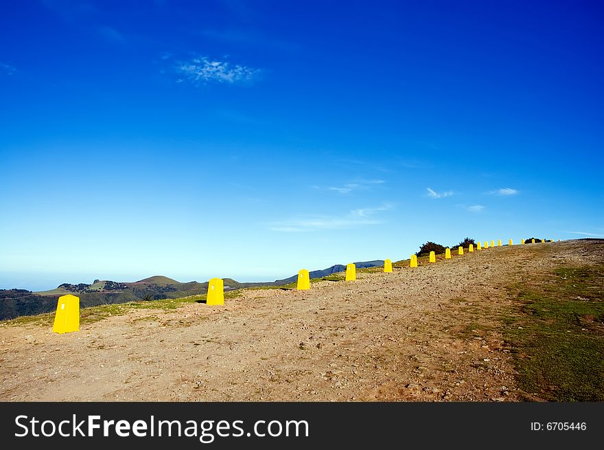 Yellow restrictive posts in Madeira mountains. Yellow restrictive posts in Madeira mountains