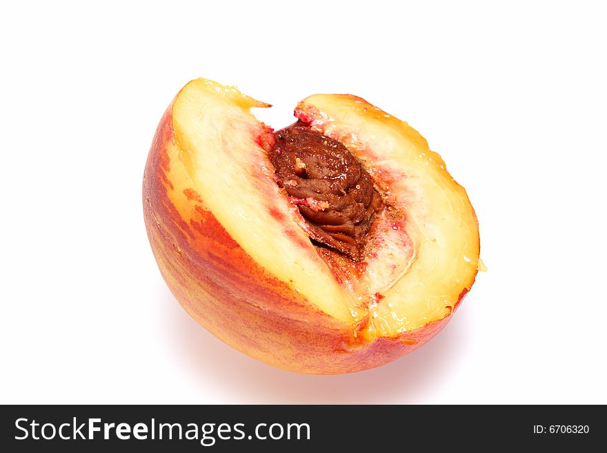 Slice of tasty juicy peach Isolated On White